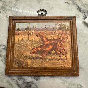 Vintage Robert A. Christie print of Irish Setters in a field.